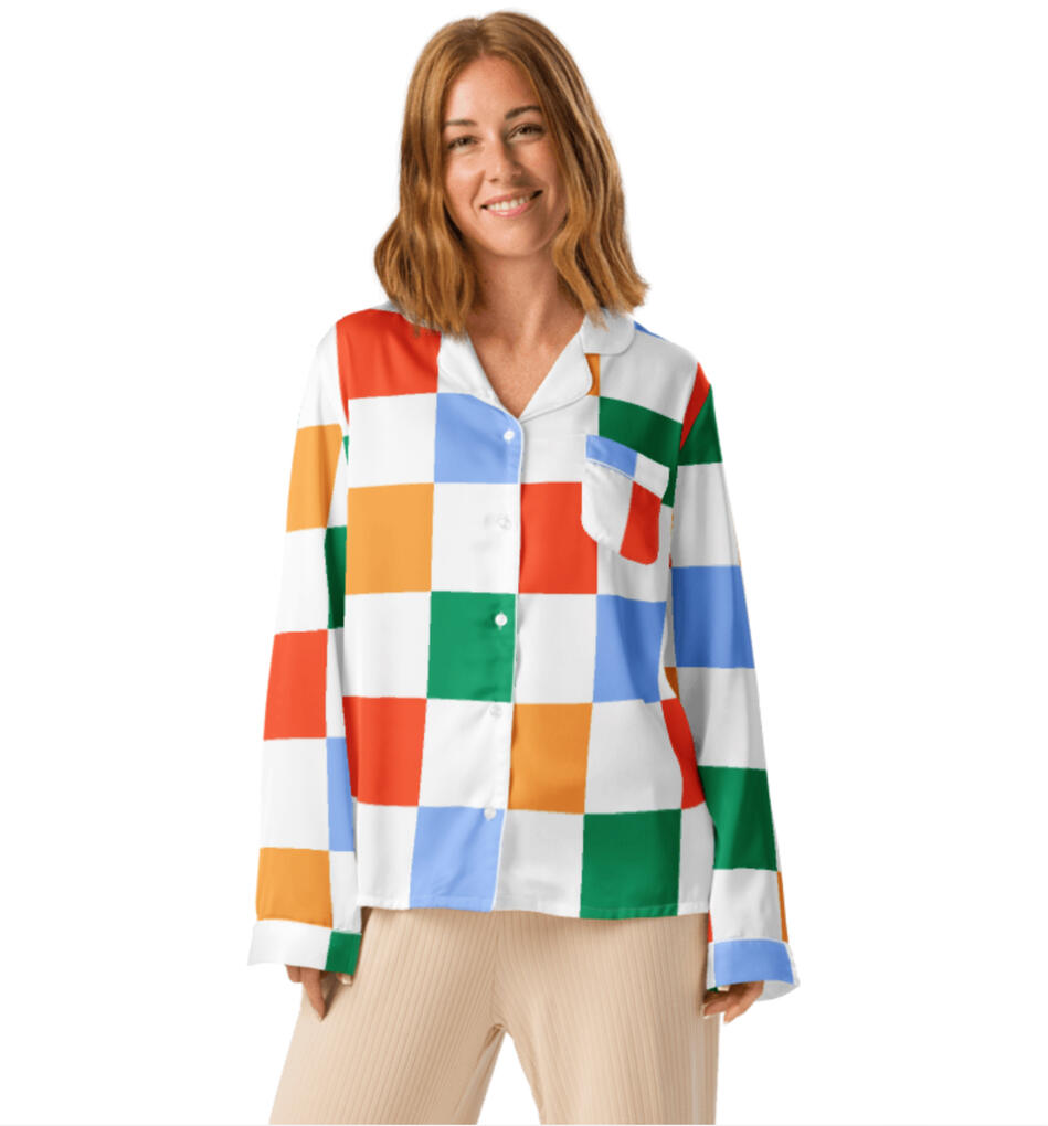 Retro checkerboard pattern in blue, green, orange and red on a soft button up pajama shirt.
