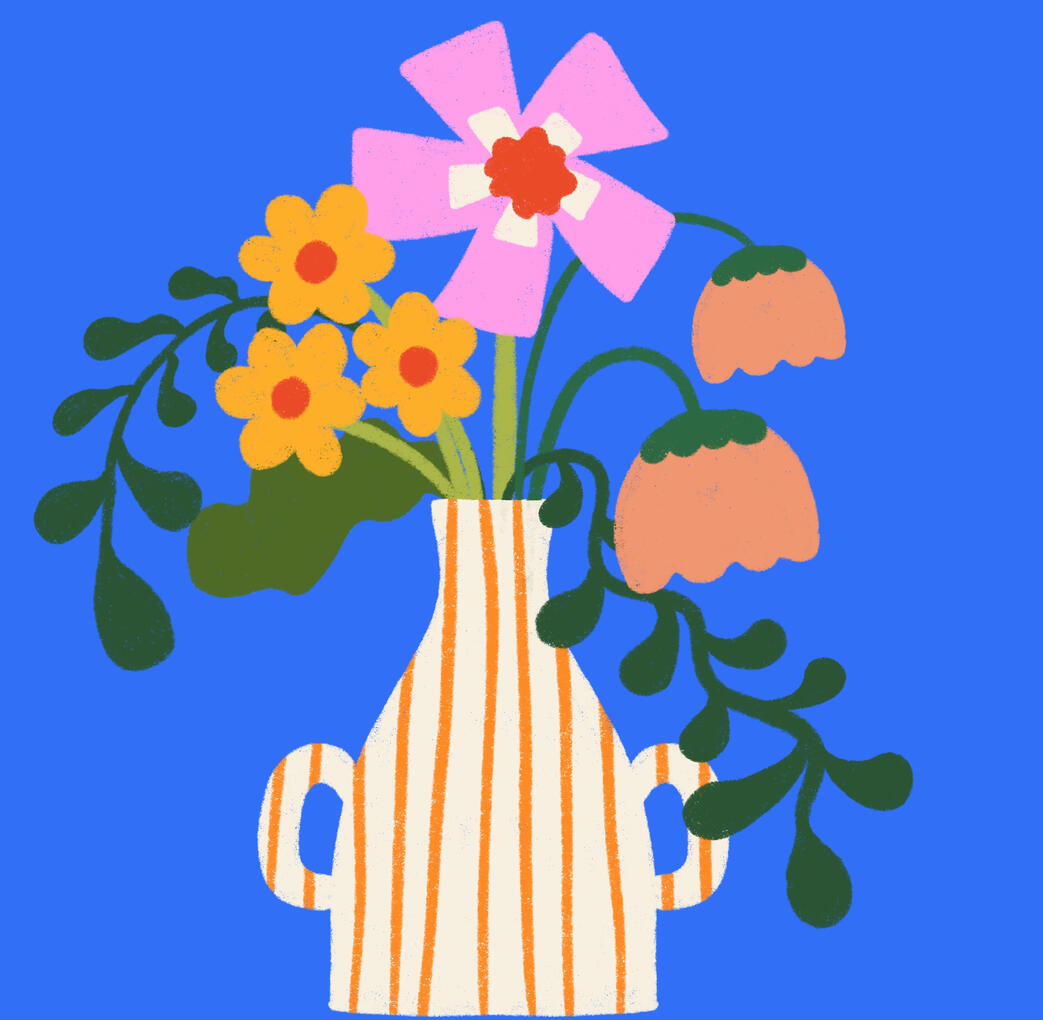 Spring Flowers Spring flowers in pinks, yellows and oranges, with green leaves in a cream colored vase with orange vertical stripes.